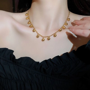 18K gold plated titanium steel necklace featuring polished round bead pendants for women