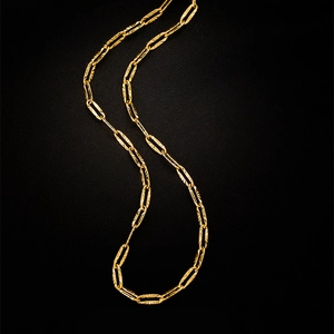 Minimalist gold plated paperclip chain necklace with textured radial engraved links