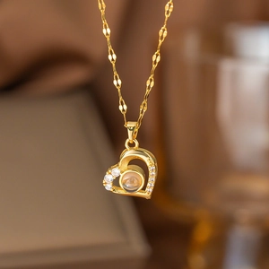Gold heart projection necklace with white zircon accents and fine chain for women