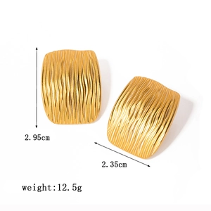 Golden sun flower earrings with vertical wavy texture dimensions 2.95cm by 2.35cm