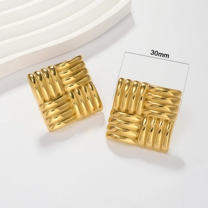 Detail shot of 30mm gold square stud earrings with woven relief texture on white background