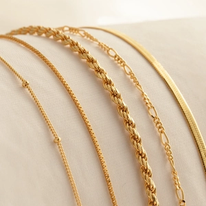 Set of five 18K gold plated stainless steel Figaro and rope chain bracelets for women