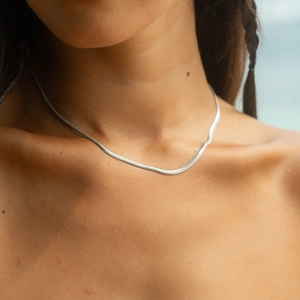 Elegant silver herringbone snake chain necklace for women in a sleek minimalist style