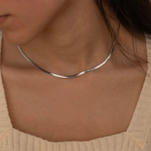 Elegant 3mm silver snake bone flat blade chain necklace on female model neck