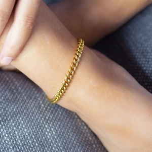 Classic 18K gold plated stainless steel Cuban link anklet worn on ankle for fashion