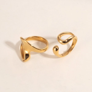 Set of two 18K gold plated stainless steel irregular rings with abstract fluid metal design