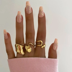 Minimalist 18K gold plated stainless steel irregular ring set on hand with pink nails