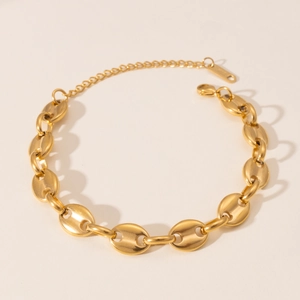 Gepolijste 18k vergulde koffieboon schakelarmband met karabijnsluiting voor dames