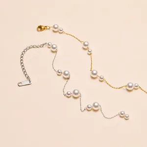 Detail von 18k Gold und Silber Perlenketten mit Karabinerverschluss und Verlängerungskette