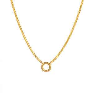 Detailed macro of a gold-plated box chain necklace featuring a circular spring clasp pendant