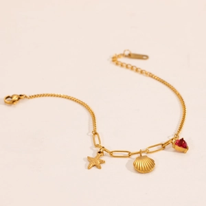 18k gold plated stainless steel bracelet with starfish shell and red heart charms