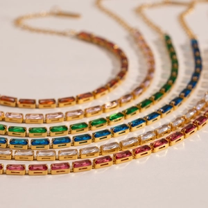 Luxurious gold-plated tennis bracelet featuring vibrant square-cut colorful zircons