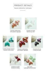 Close-up of fishtail resin charms in vibrant pearlescent and metallic color gradients