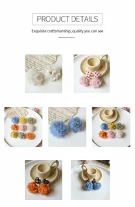 Dettagli di orecchini con pompon colorati e ciondoli a cuore per creazione gioielli fai-da-te