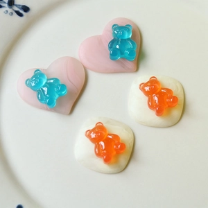 DIY colorful jelly bear resin charms in candy pink and orange for phone case decor