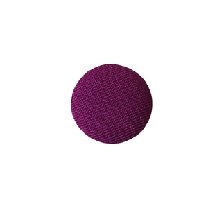 Classic round fabric covered button in dark purple for coats and suits with twill texture
