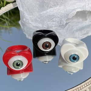 Vintage heart-shaped eyeball rings in red, black, and white colors with resin finish