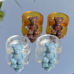Lindos anillos de oso en resina ámbar y azul transparente con superficie brillante