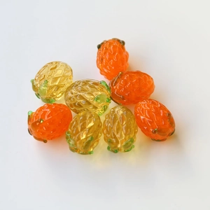 Handgemaakte ananas glaskralen in amber en oranje kleuren voor DIY sieraden maken