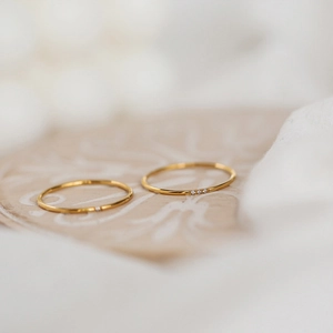 Minimalist gold ultra-thin zircon stackable rings with delicate single and triple stones