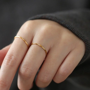 Minimalist gold thin zircon ring set featuring two dainty bands with tiny diamond accents