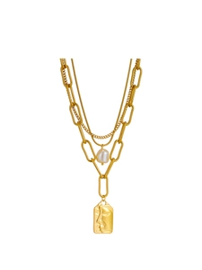 Detail view of layered gold necklace with water-drop pearl and rectangular face pendant