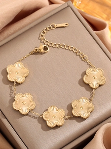 Bracelet trèfle à cinq fleurs en acier titane doré avec texture soleil et poinçon K18
