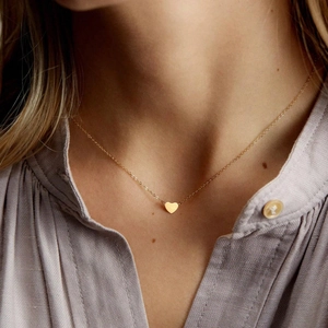 Elegant gold titanium heart pendant necklace for women on minimalist cable chain