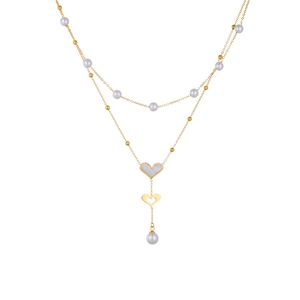Double-layered gold-plated heart necklace with white pearl accents and mop heart pendant