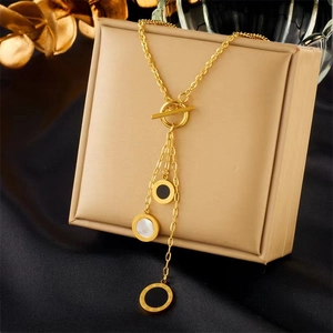 Luxury gold titanium steel necklace with Roman numeral pendants and black and white shells