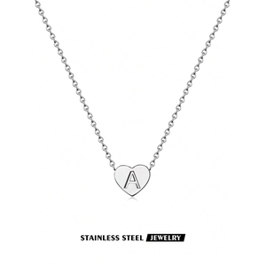 Polished silver heart pendant necklace featuring an engraved letter A on a thin O-chain