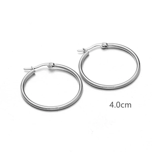 Detail view of 4.0cm silver hoop earrings showing the polished finish and size measurement