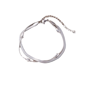 Double-layered silver snake chain bracelet with oval bead accents and lobster clasp