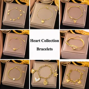 Elegant gold titanium bracelets collection featuring heart and ocean motifs with lobster clasp