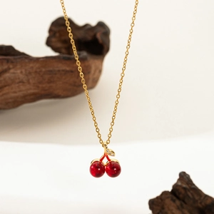 Elegant gold titanium steel necklace with red cherry pendant and sparkling rhinestones