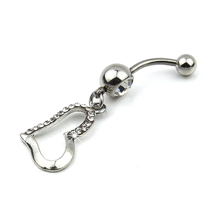 Macro shot of silver heart belly ring with sparkling crystals on a white background