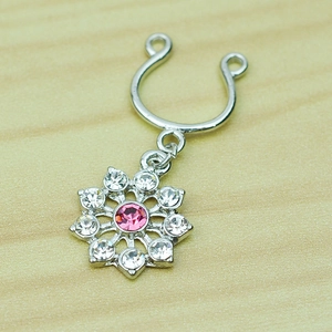 U-shaped non-piercing ring with silver flower pendant and pink crystal center