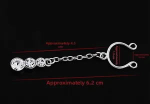 Silver clip-on nipple ring with rhinestones and chain measured at approx. 6.2cm long
