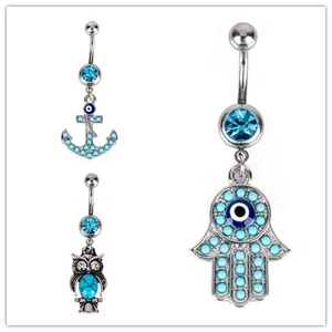 Set of three belly rings with turquoise anchor, owl, and Hamsa hand evil eye charms