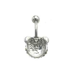 Macro detail of silver panda navel piercing back view showing metal texture and ball screw