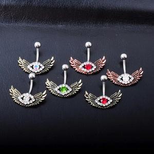 Macro view of six crystal wing navel rings in various metal finishes on black leather