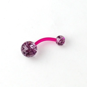 Detail of pink acrylic belly ring with purple glitter sequins in asymmetric spheres
