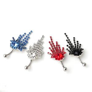 Set of four stainless steel belly rings with tassel flame design and colorful rhinestones