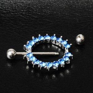 Piercing de pezón en acero quirúrgico plateado con incrustaciones de circón azul