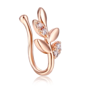 Macro view of rose gold leaf nose clip with sparkling zircons and U-shaped non-pierced design