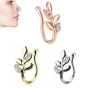Detailed view of leaf-shaped non-piercing nose clips with zircon studs in three metal finishes