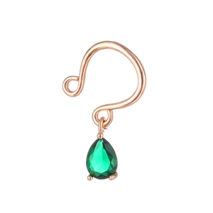 Detail of rose gold non-piercing ring with a sparkling pear-cut green zircon pendant