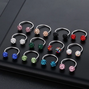 Set of 12 colorful stainless steel horseshoe rings with sparkling crystal balls for piercings