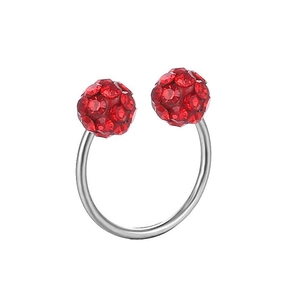 Macro detail of silver stainless steel horseshoe piercing with red crystal disco balls