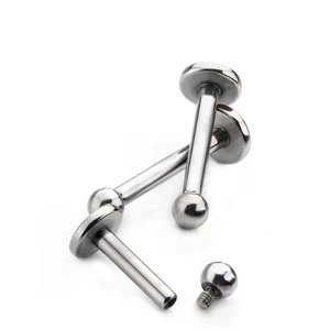 G23 titanium labret piercing stud set with flat back and polished ball top on white background